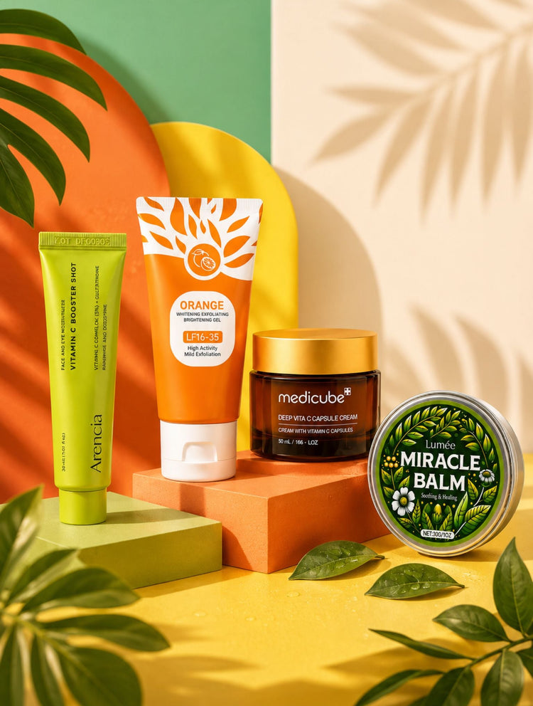 A curated skincare set featuring a green tube, an orange tube, a dark amber jar, and a silver tin of Miracle Balm, styled with tropical leaves and geometric color blocks.